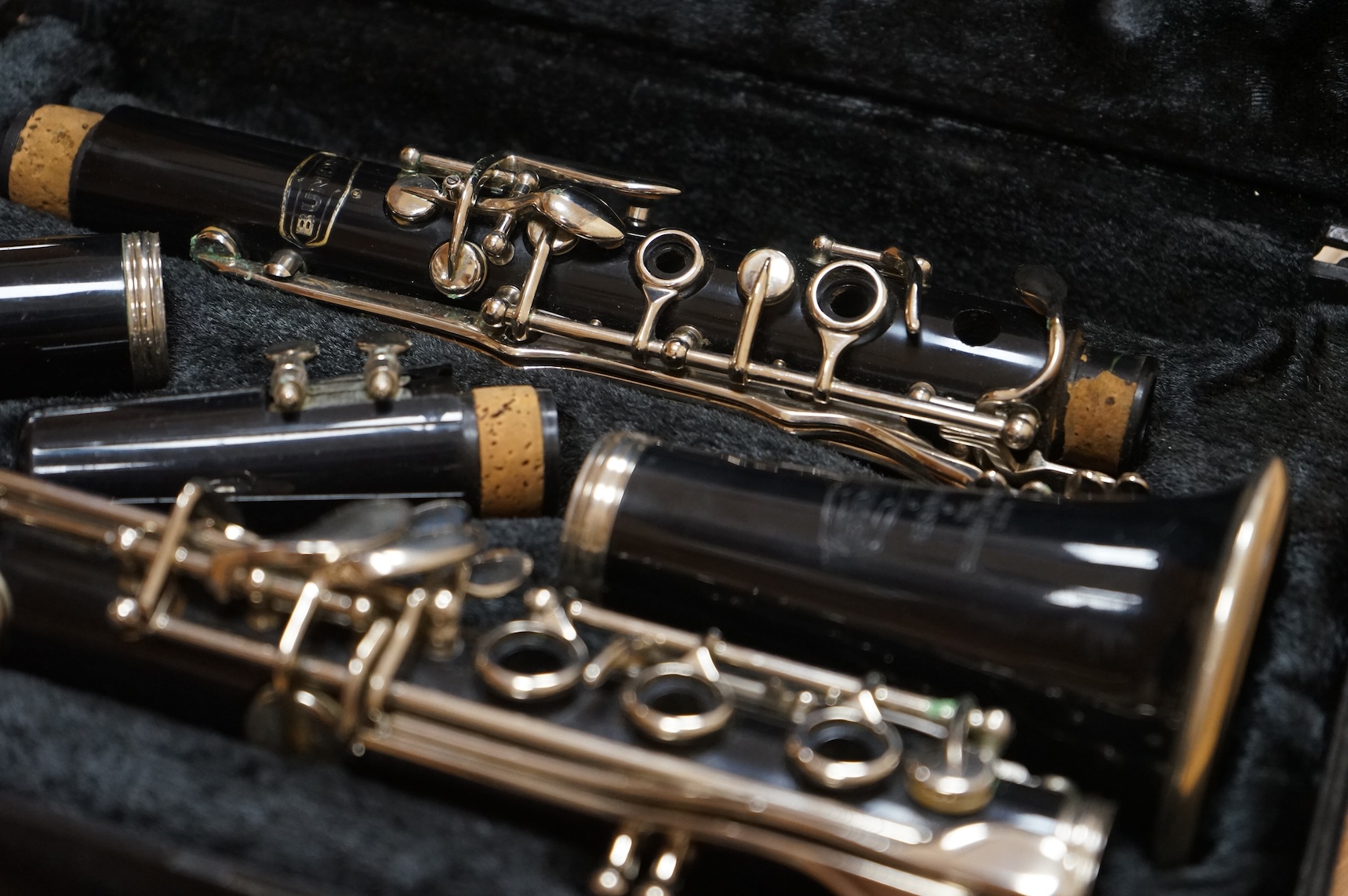 A cased Selmer plastic Bb clarinet.